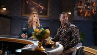 Damian and Lily look at Neil's portrait on the wall | Image: JPI